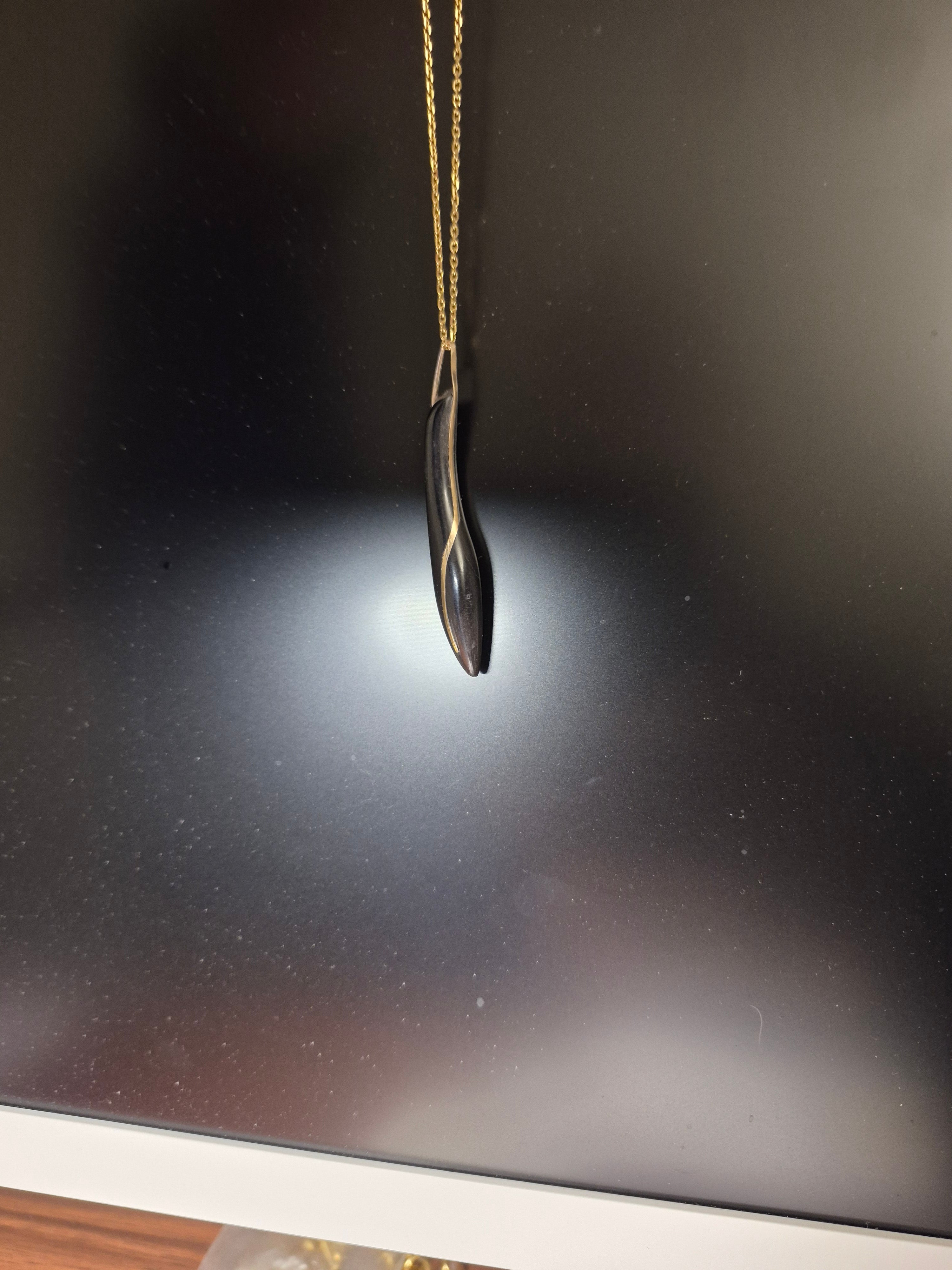 Black and Gold stone pendant