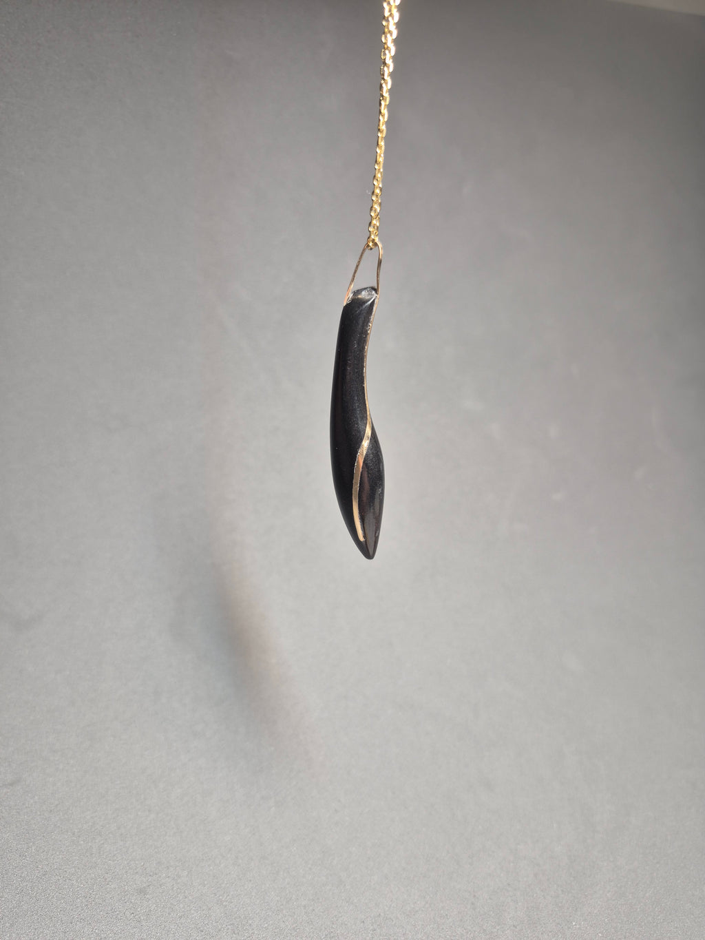 Black and Gold stone pendant