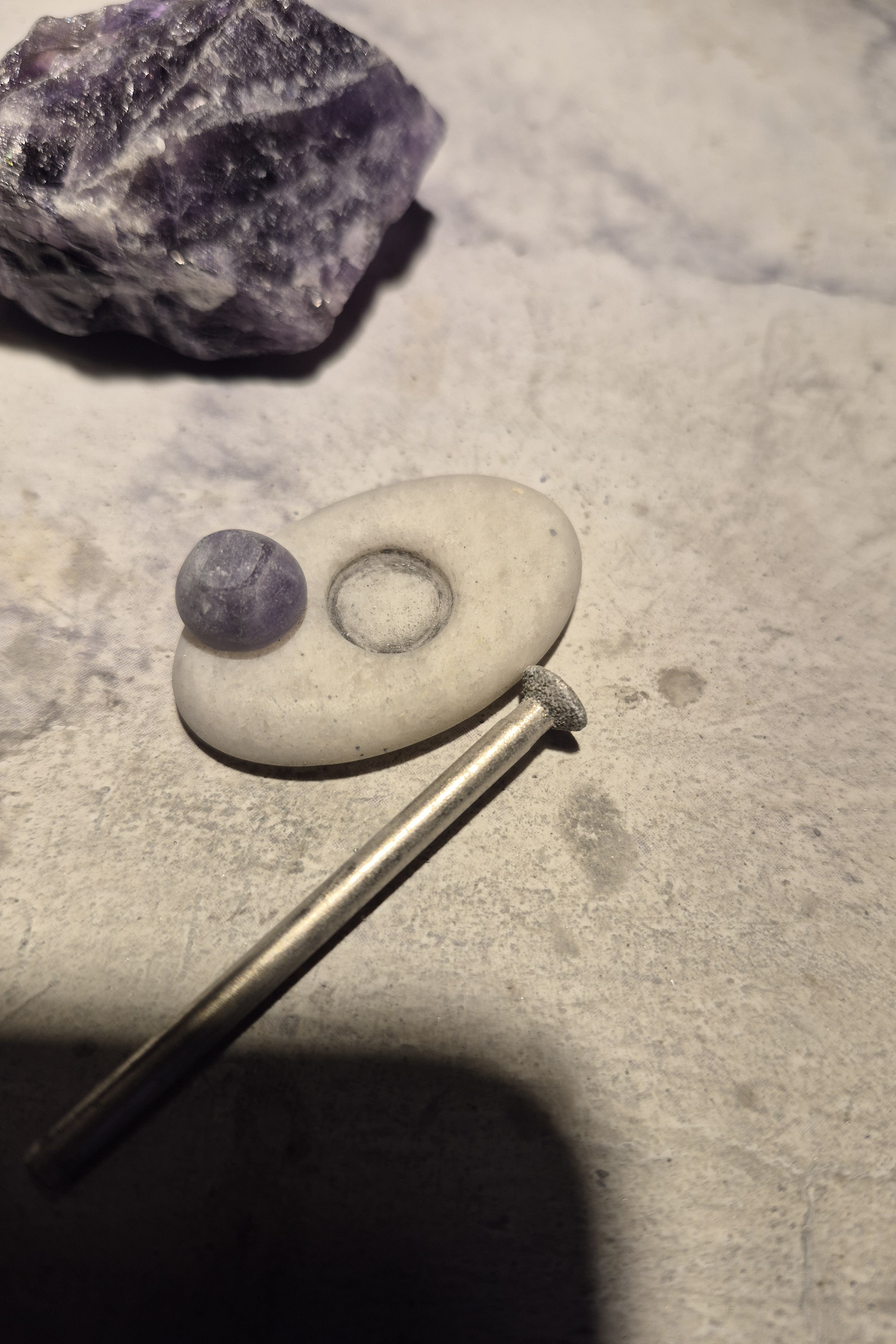Oval stone pendant with CZ mounted on amethyst
