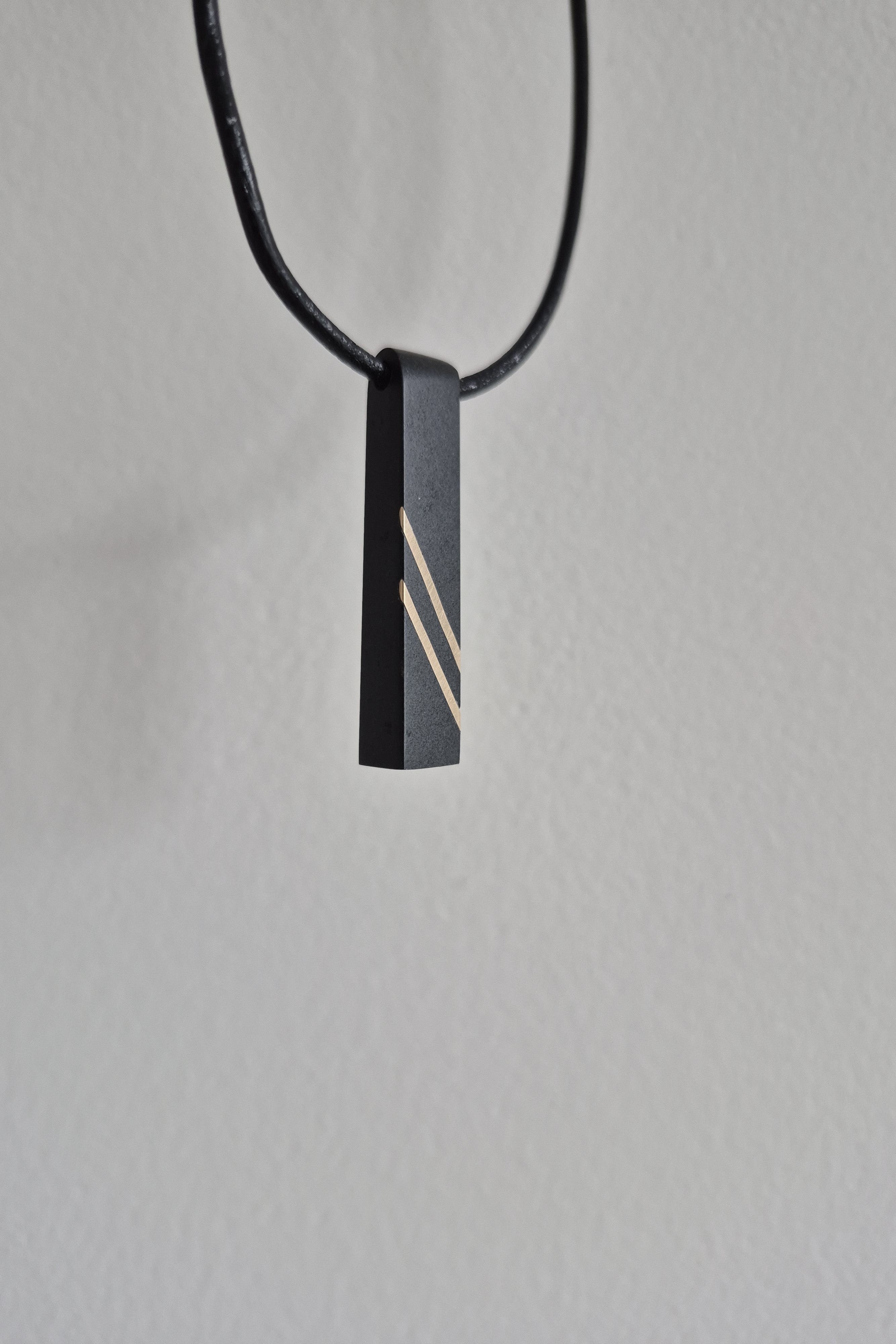 Black Bar Stone and Gold Pendant