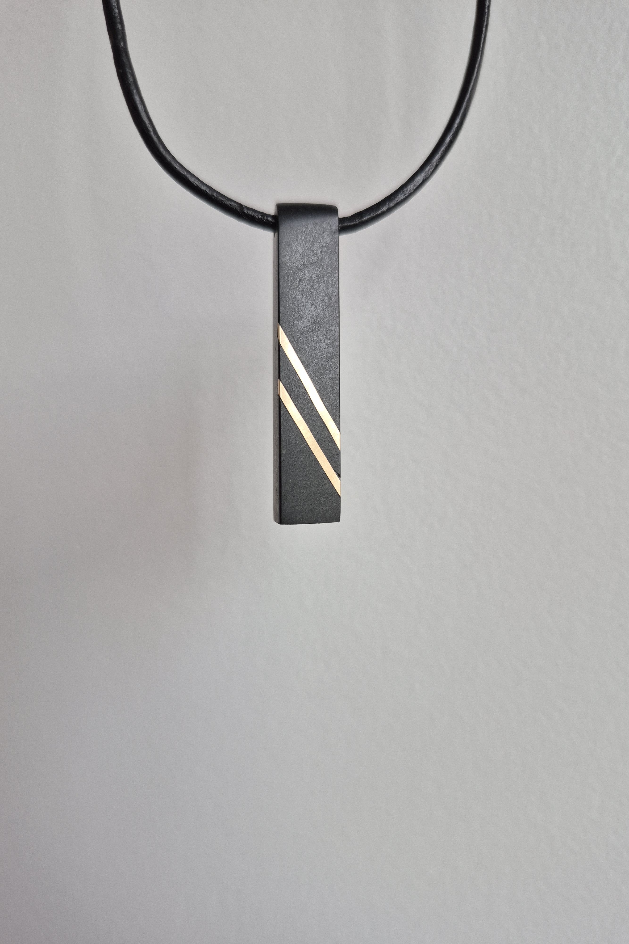 Black Bar Stone and Gold Pendant