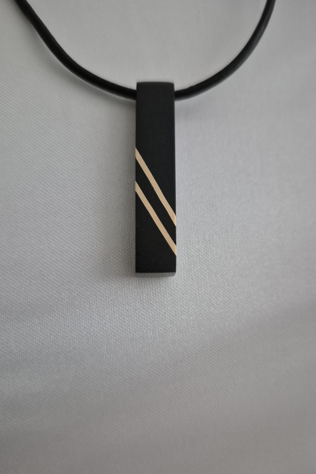 Black Bar Stone and Gold Pendant