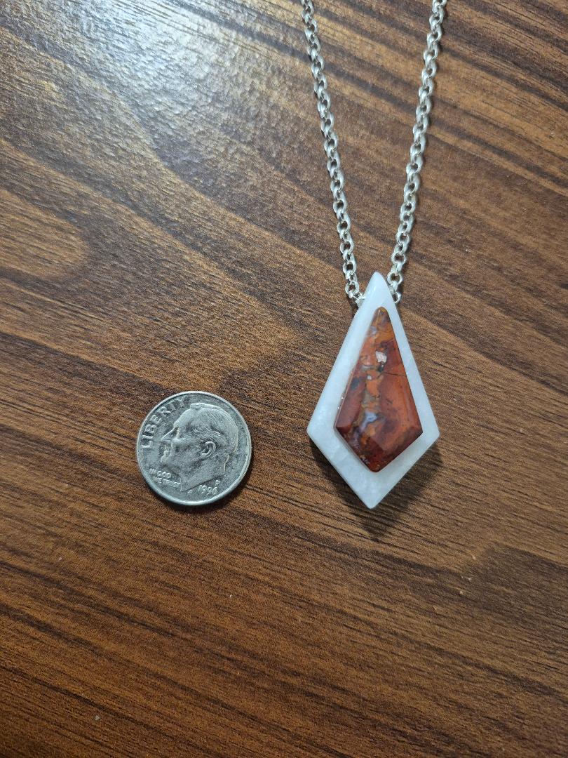 Kite-shaped pendant brown on white base art deco inspired